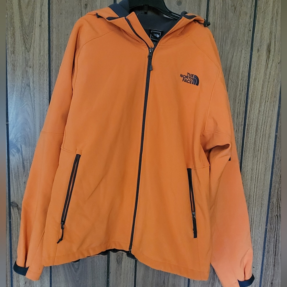 The north face orange zip up with fleece lining size Large